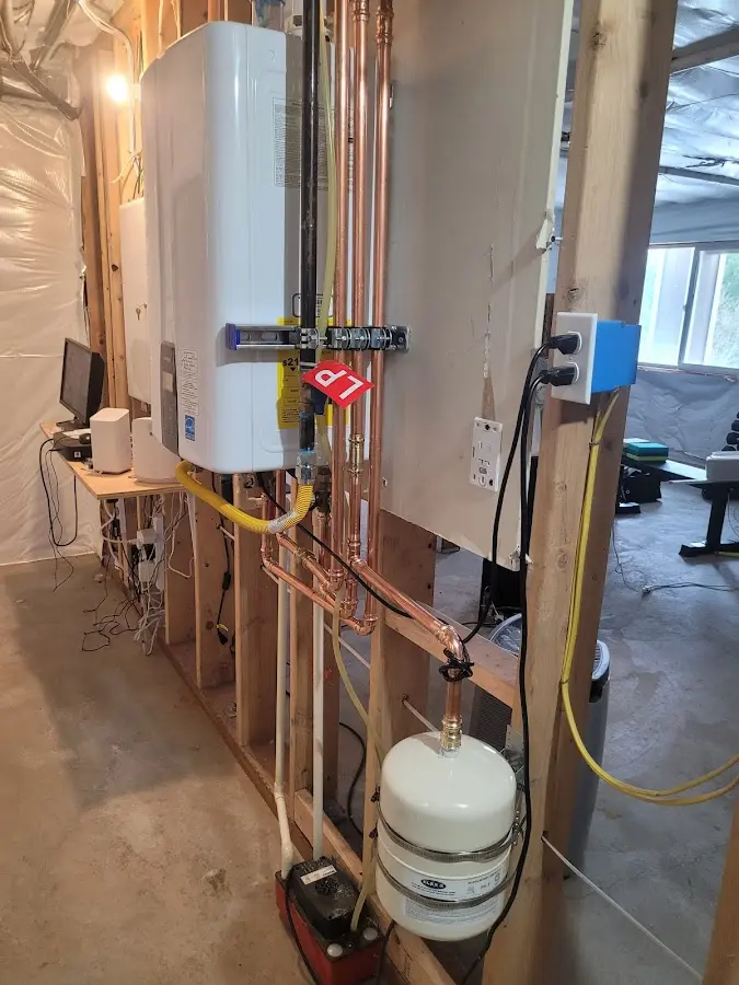 Licensed plumber repairing a kitchen sink in Decatur